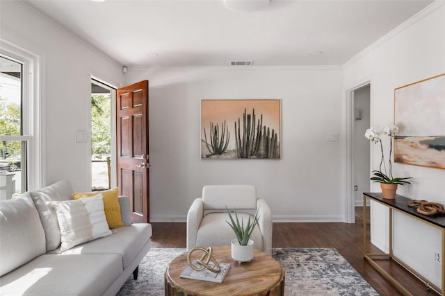 5306 Harmon Ave, Austin, TX 78751 - living area with crown molding and dark wood-style floors