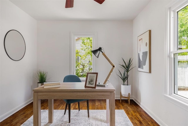 5306 Harmon Ave, Austin, TX 78751 - office space with ceiling fan and dark wood-type flooring