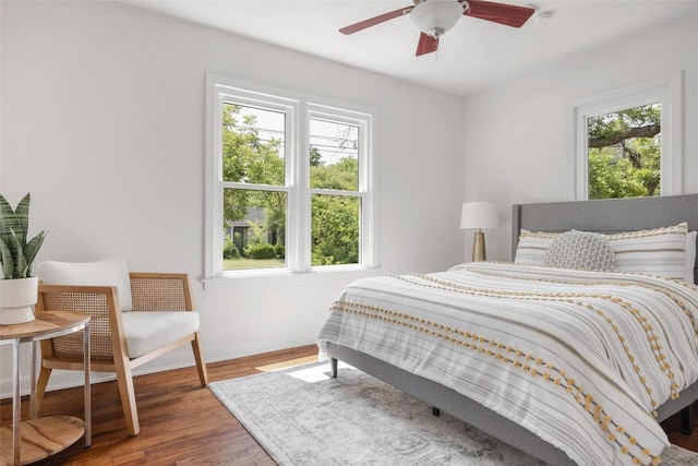 5306 Harmon Ave, Austin, TX 78751 - bedroom with wood finished floors and ceiling fan