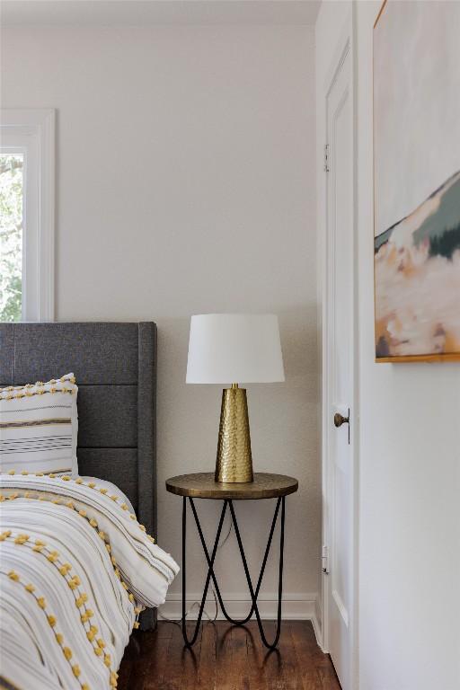 5306 Harmon Ave, Austin, TX 78751 - bedroom with baseboards and wood finished floors