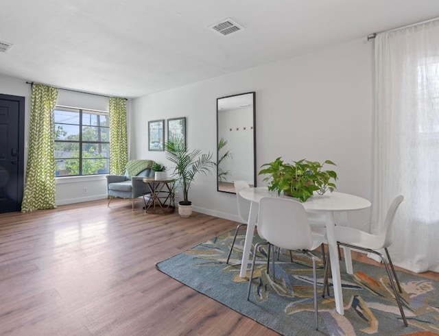 5206 Ledesma Rd, Austin, TX 78721 - dining area featuring wood finished floors and baseboards