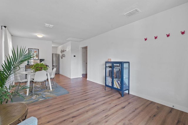 5206 Ledesma Rd, Austin, TX 78721 - living area featuring wood finished floors and baseboards