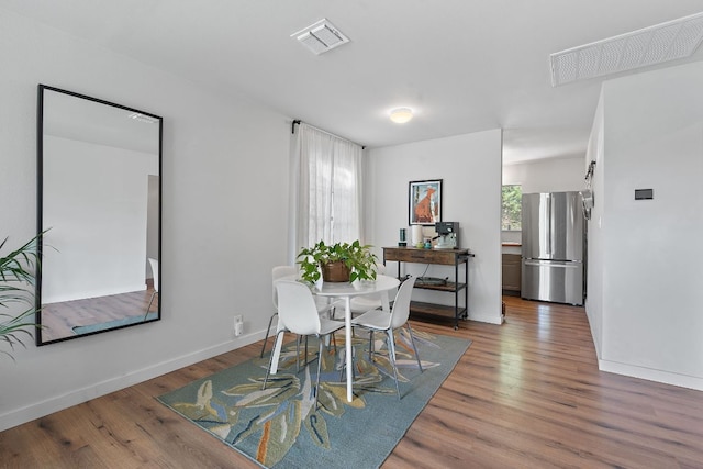5206 Ledesma Rd, Austin, TX 78721 - dining space featuring wood finished floors and baseboards