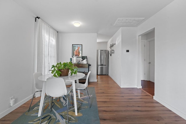 5206 Ledesma Rd, Austin, TX 78721 - dining space with wood finished floors and baseboards