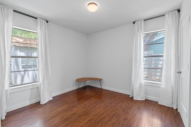 5206 Ledesma Rd, Austin, TX 78721 - empty room with wood finished floors and baseboards