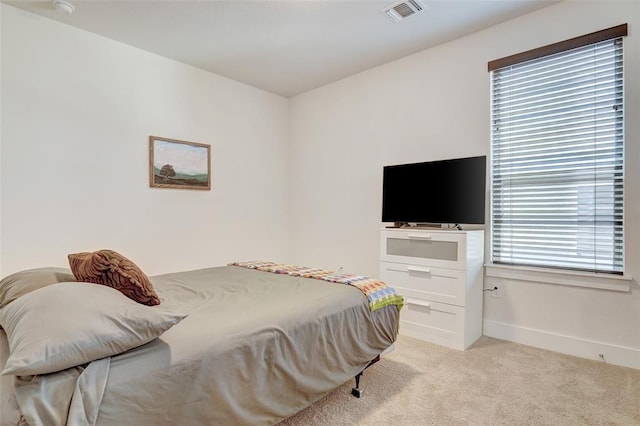 1801 Roseburg Dr Unit 29, Austin, TX 78754 - bedroom with light colored carpet and baseboards