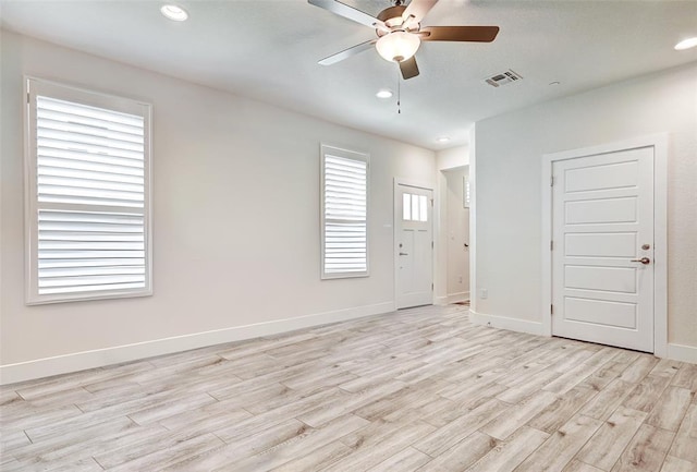 1801 Roseburg Dr Unit 29, Austin, TX 78754 - empty room featuring light wood-style flooring, ceiling fan, baseboards, and recessed lighting