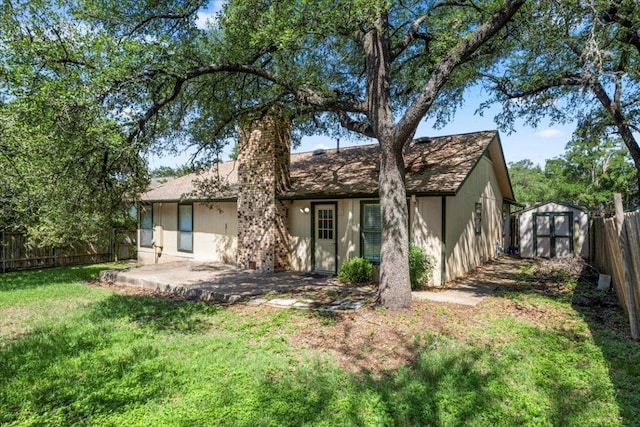 12103 Wycliff Ln, Austin, TX 78727 - rear view of house with a patio