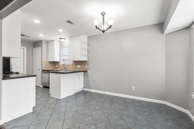 12103 Wycliff Ln, Austin, TX 78727 - kitchen featuring dark countertops, white cabinets, open shelves, decorative backsplash, and light tile patterned floors