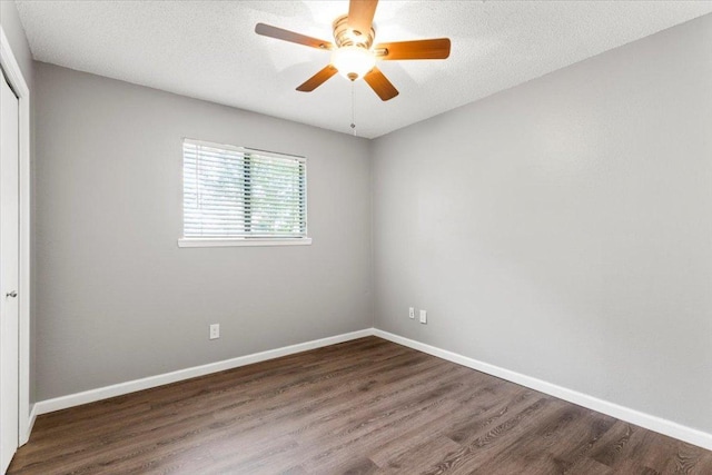 12103 Wycliff Ln, Austin, TX 78727 - unfurnished room with wood finished floors, baseboards, ceiling fan, and a textured ceiling