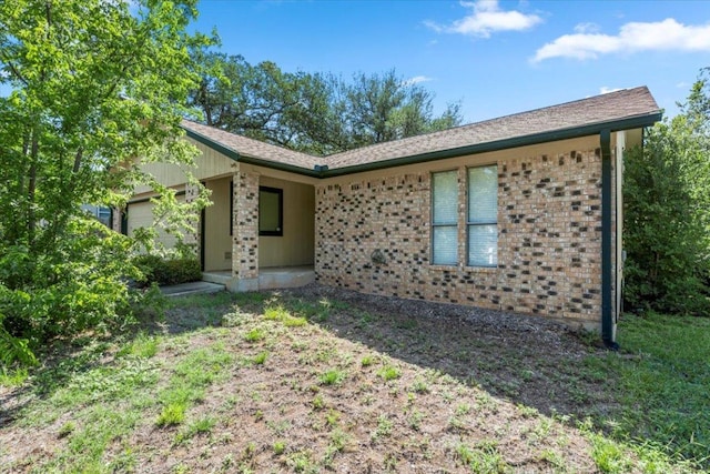 12103 Wycliff Ln, Austin, TX 78727 - ranch-style house with an attached garage and brick siding