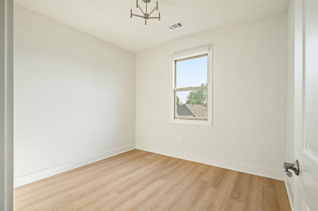 4048 Berkman Dr, Austin, TX 78723 - unfurnished room featuring light wood-style floors and baseboards