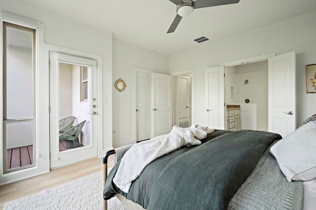 4048 Berkman Dr, Austin, TX 78723 - bedroom with wood finished floors, a ceiling fan, and connected bathroom