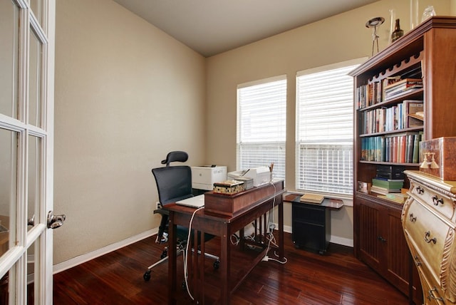 3808 Mattie St, Austin, TX 78723 - home office featuring dark wood-style flooring and baseboards