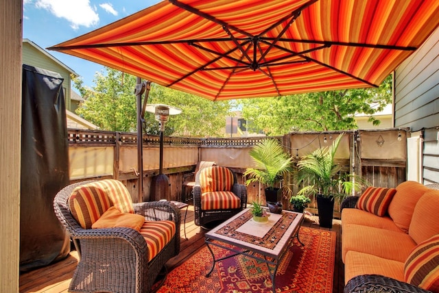 3808 Mattie St, Austin, TX 78723 - fenced backyard with an outdoor living space and a wooden deck