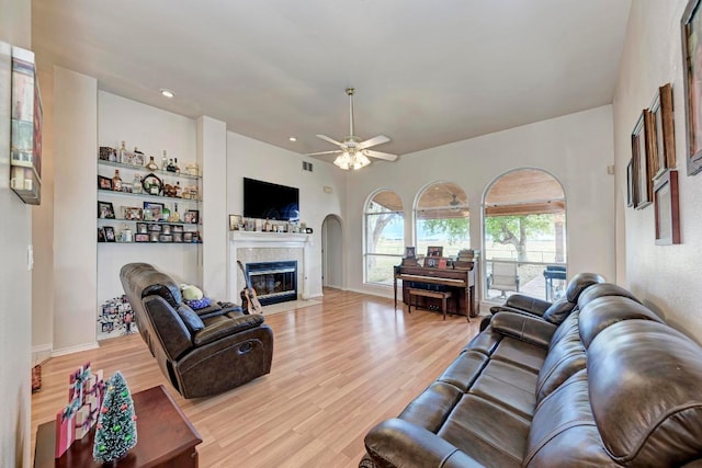 1610 Meadow Ln, Lockhart, TX 78644 - living area with ceiling fan, light wood-style flooring, a fireplace with flush hearth, and recessed lighting