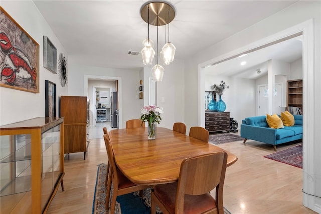 6903 Moonmont Dr, Austin, TX 78745 - dining space with light wood finished floors