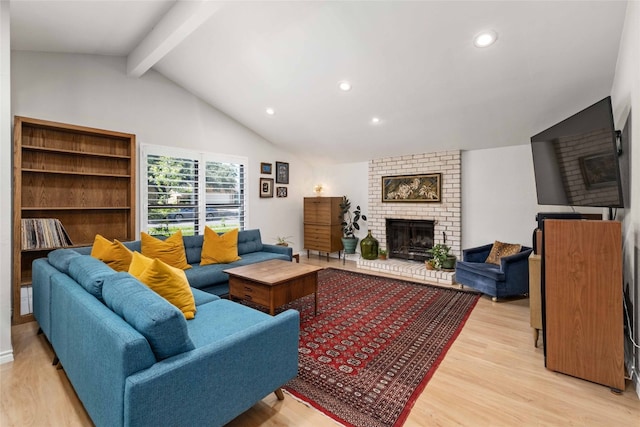 6903 Moonmont Dr, Austin, TX 78745 - living room featuring a fireplace, light wood-type flooring, and recessed lighting