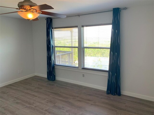 4102 Glendale Ln, Lago Vista, TX 78645 - spare room with plenty of natural light, wood finished floors, and a ceiling fan
