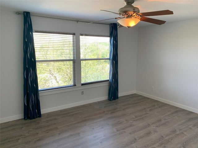4102 Glendale Ln, Lago Vista, TX 78645 - unfurnished room featuring a ceiling fan and wood finished floors