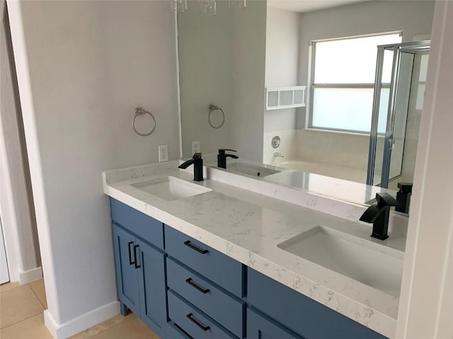 4102 Glendale Ln, Lago Vista, TX 78645 - bathroom featuring double vanity, tile patterned floors, a bath, and a shower stall