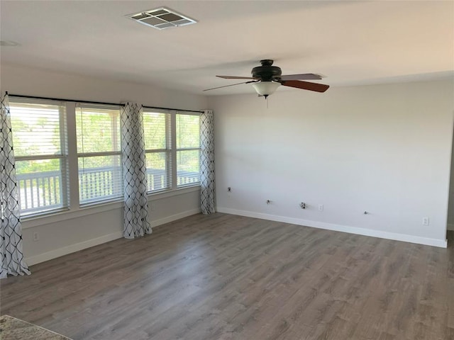 4102 Glendale Ln, Lago Vista, TX 78645 - spare room featuring wood finished floors and ceiling fan