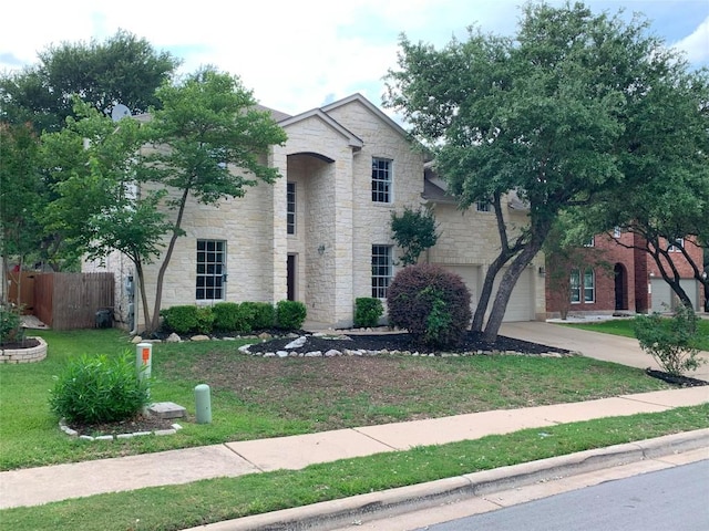 1813 Country Squire Dr, Cedar Park, TX 78613 - view of front of home with stone siding, concrete driveway, and a garage