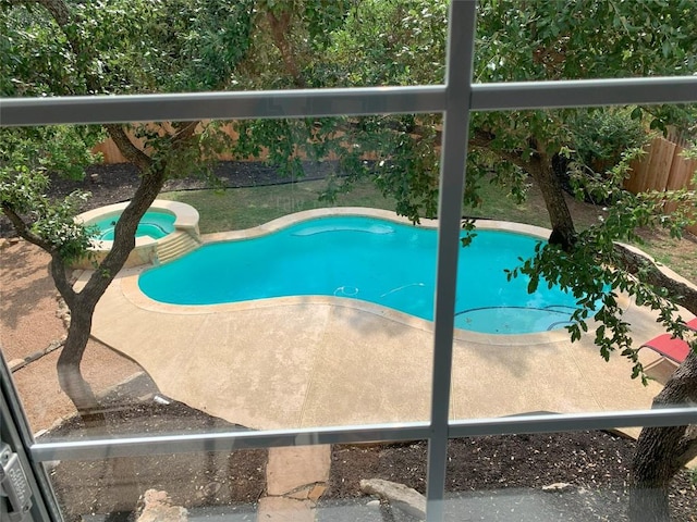 1813 Country Squire Dr, Cedar Park, TX 78613 - view of pool featuring a fenced backyard, a pool with connected hot tub, and a patio area