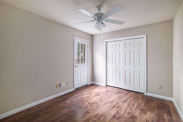 2509 Riddle Rd, Austin, TX 78748 - unfurnished bedroom with baseboards, wood finished floors, a closet, and ceiling fan