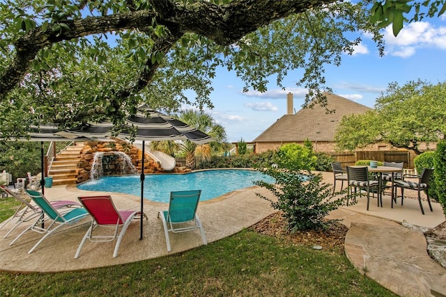 405 Mirafield Ln, Austin, TX 78737 - view of pool featuring a water slide, stairway, and a patio