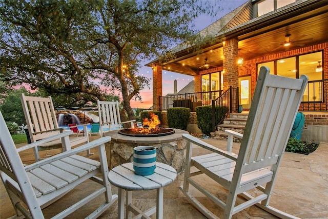 405 Mirafield Ln, Austin, TX 78737 - wooden terrace with a fire pit and a patio
