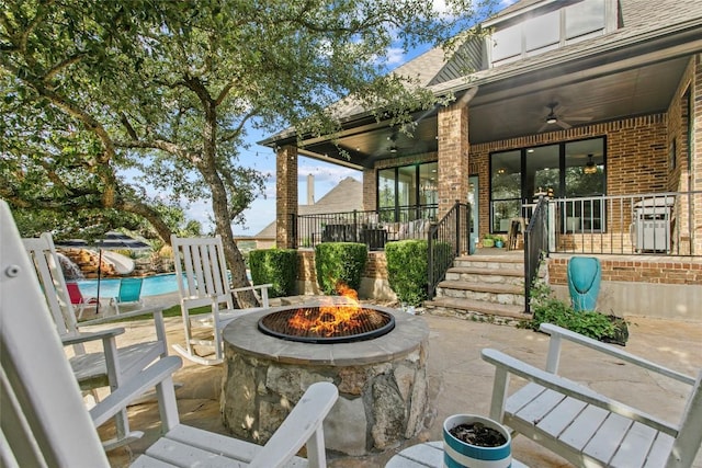 405 Mirafield Ln, Austin, TX 78737 - view of patio / terrace featuring a ceiling fan and an outdoor fire pit
