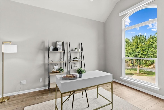 405 Mirafield Ln, Austin, TX 78737 - office area featuring vaulted ceiling and wood finished floors