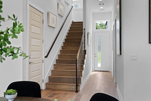 5324 Agatha Cir, Austin, TX 78724 - foyer entrance featuring stairs and light wood-style flooring