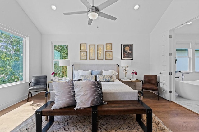 5324 Agatha Cir, Austin, TX 78724 - bedroom featuring vaulted ceiling, multiple windows, wood finished floors, recessed lighting, and ceiling fan