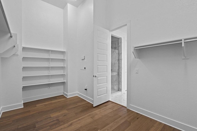 5324 Agatha Cir, Austin, TX 78724 - walk in closet featuring dark wood-type flooring