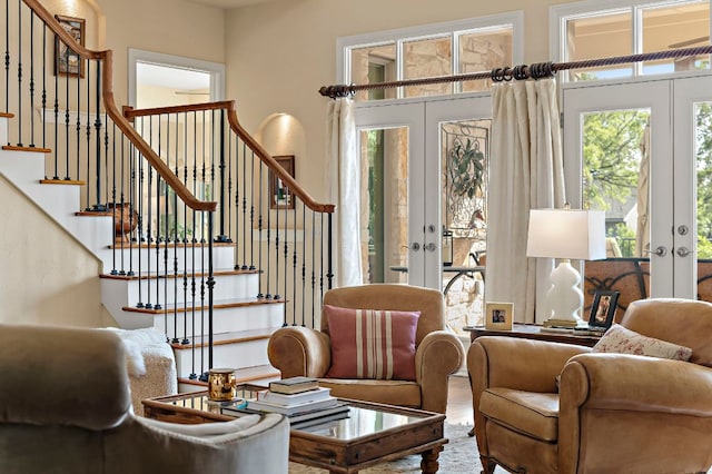 1607 The High Rd, Austin, TX 78746 - living area with french doors, plenty of natural light, and stairway