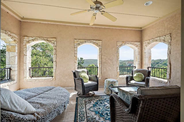 1607 The High Rd, Austin, TX 78746 - bedroom with multiple windows, tile patterned flooring, and a ceiling fan