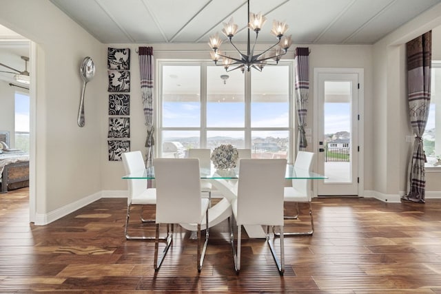 2329 Sandorna Ct, Leander, TX 78641 - dining space with a chandelier, healthy amount of natural light, and dark wood finished floors