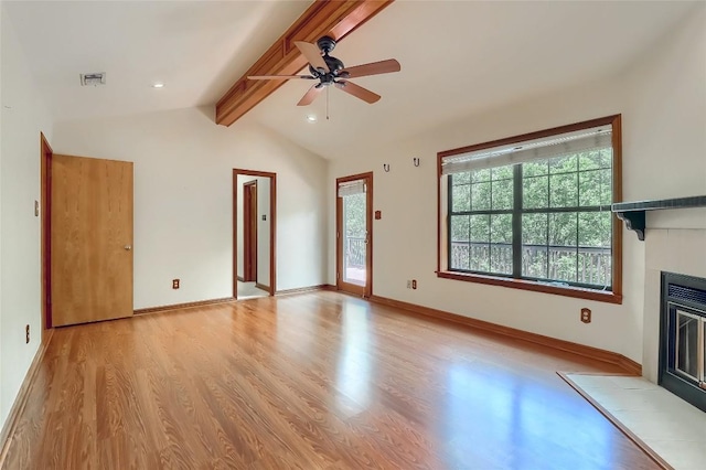 213 Hurst Creek Rd, Austin, TX 78734 - unfurnished living room featuring light wood-style floors, a fireplace with flush hearth, a ceiling fan, and baseboards