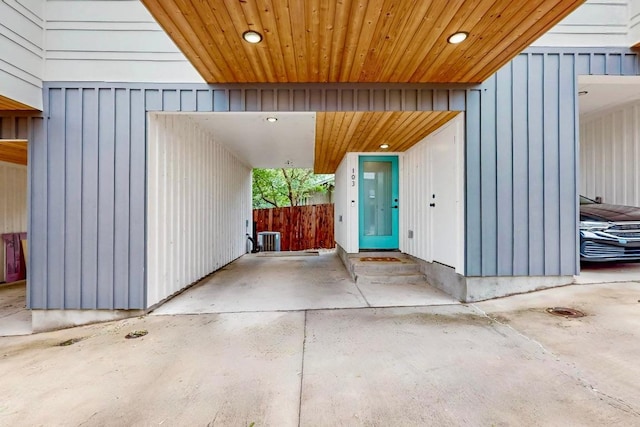 913 Duncan Ln Unit 103, Austin, TX 78705 - doorway to property with an attached carport