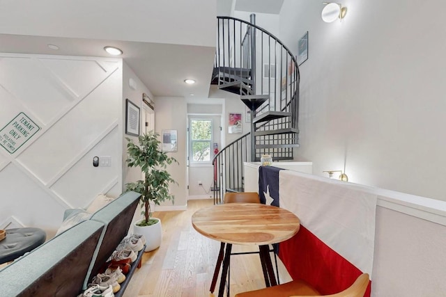 913 Duncan Ln Unit 103, Austin, TX 78705 - entrance foyer featuring wood finished floors, stairway, baseboards, and recessed lighting