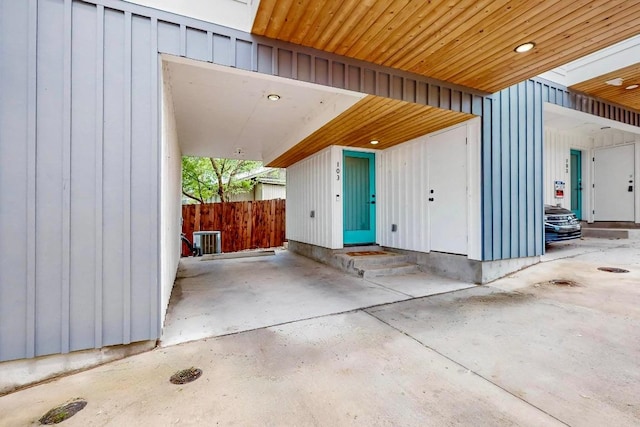 913 Duncan Ln Unit 103, Austin, TX 78705 - property entrance featuring board and batten siding and central AC unit
