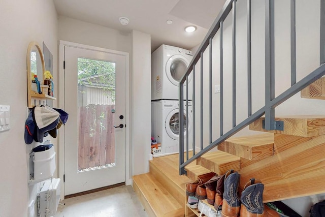 913 Duncan Ln Unit 103, Austin, TX 78705 - entryway with stacked washer / drying machine, stairway, and recessed lighting