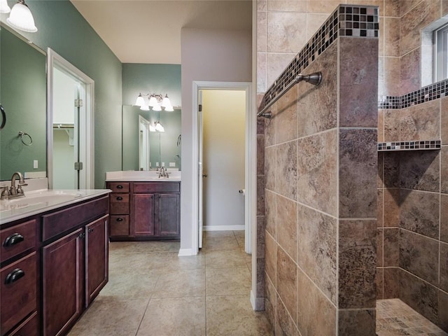 1501 Daylily Loop, Georgetown, TX 78626 - full bath featuring a walk in shower, tile patterned floors, and two vanities