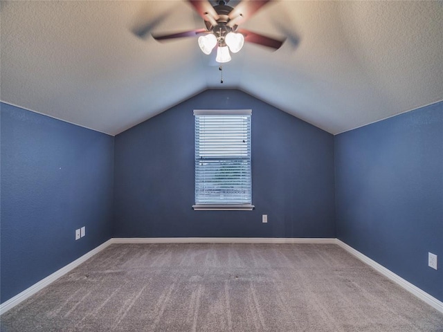 1501 Daylily Loop, Georgetown, TX 78626 - additional living space featuring ceiling fan, carpet floors, a textured ceiling, and lofted ceiling
