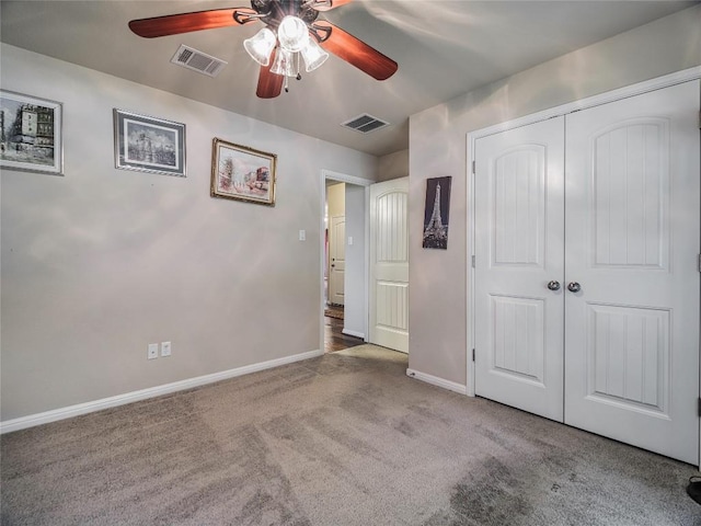 1501 Daylily Loop, Georgetown, TX 78626 - unfurnished bedroom with carpet flooring, baseboards, a closet, and a ceiling fan