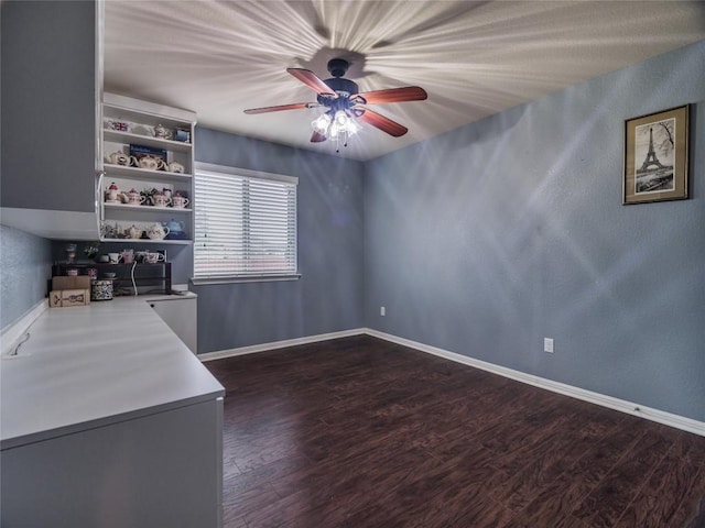 1501 Daylily Loop, Georgetown, TX 78626 - unfurnished living room featuring ceiling fan, wood finished floors, and baseboards