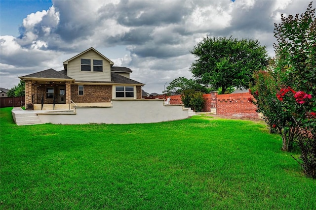1501 Daylily Loop, Georgetown, TX 78626 - back of house featuring a shingled roof and brick siding