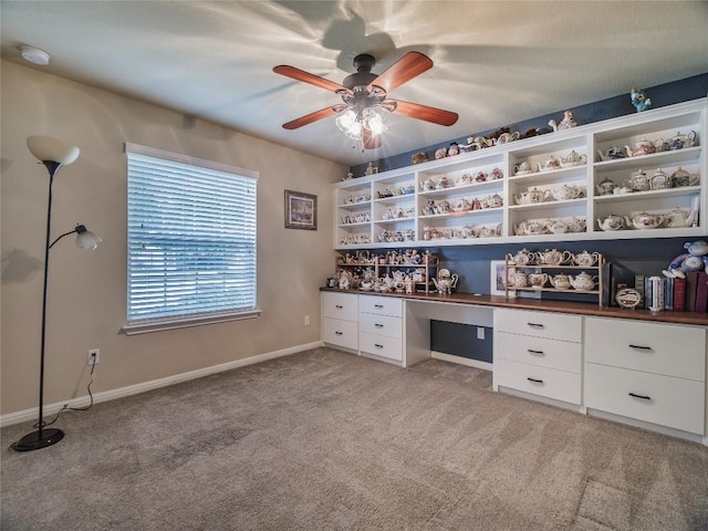 1501 Daylily Loop, Georgetown, TX 78626 - unfurnished office with built in desk, light carpet, a ceiling fan, and baseboards